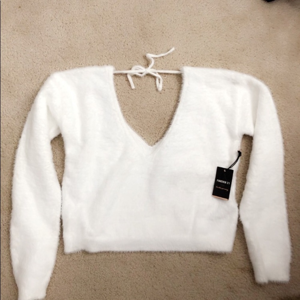 white fuzzy sweater